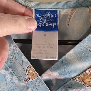 The Wonderful World of Disney Light Blue Floral Top Scrubs